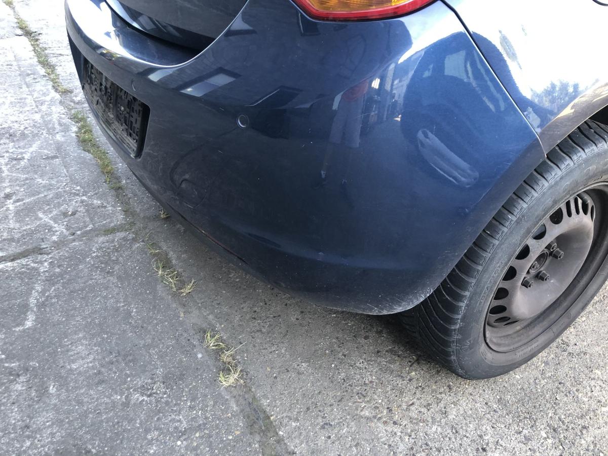 Opel Astra J Stoßfänger hinten Heckschürze mit PDC 5 türer Z22A Waterworld Met