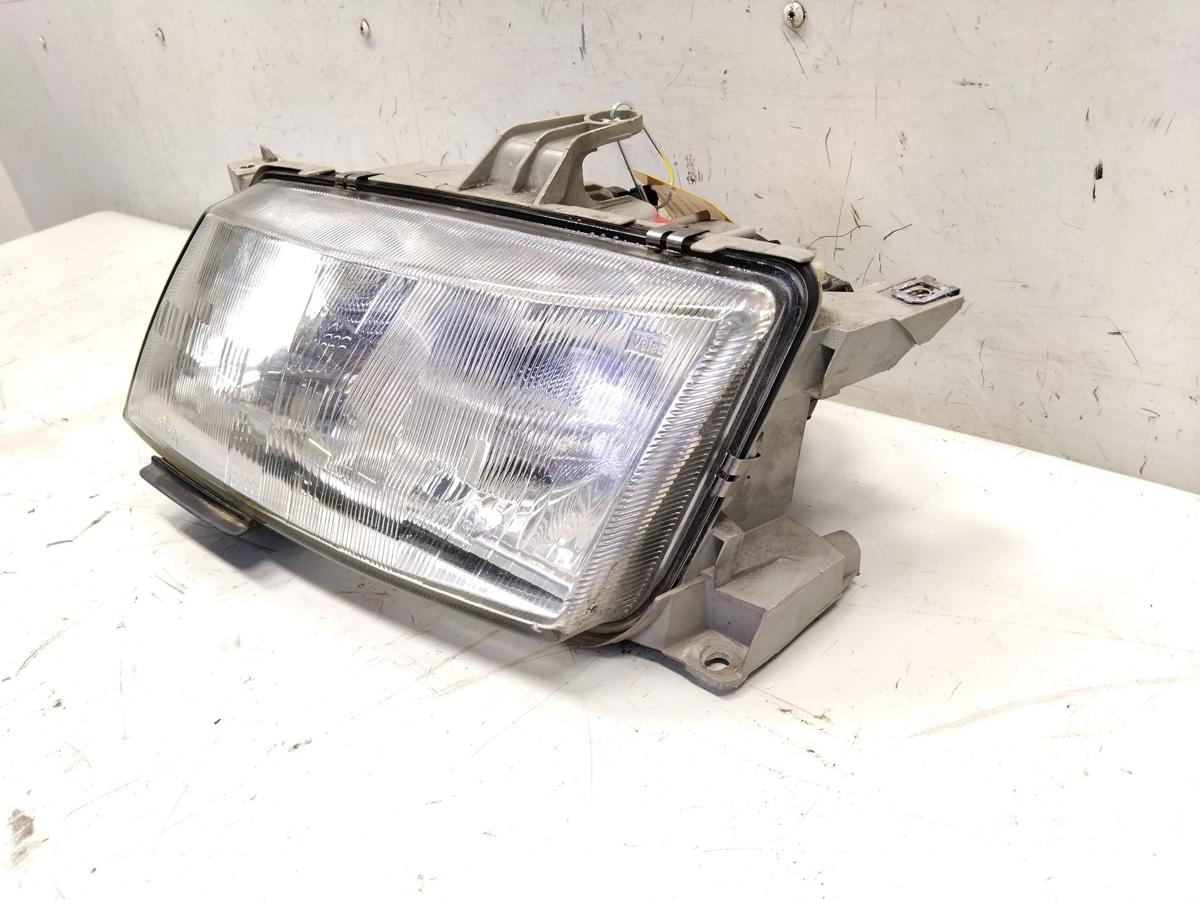 Saab 9-5 Kombi original Scheinwerfer links Valeo mit LWR Bj.1999