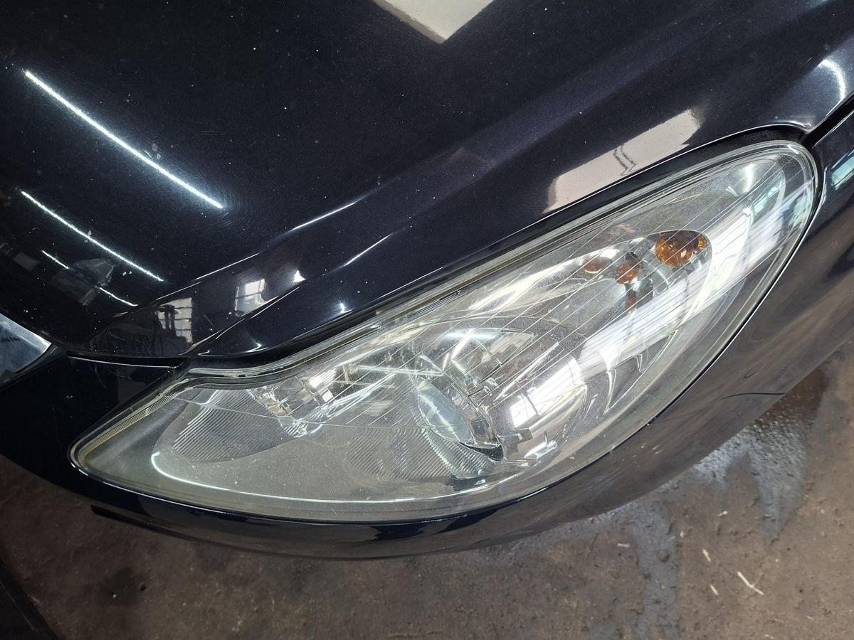 Opel Corsa D original Scheinwerfer links mit Kurvenlicht Bj 2007