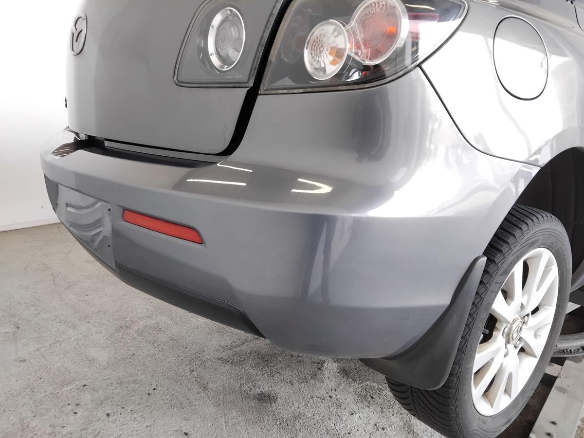 Mazda 3 BK orig Sto&szlig;f&auml;nger Sto&szlig;stange hinten 5t&uuml;rig Flie&szlig;heck BJ2008 graumetallic