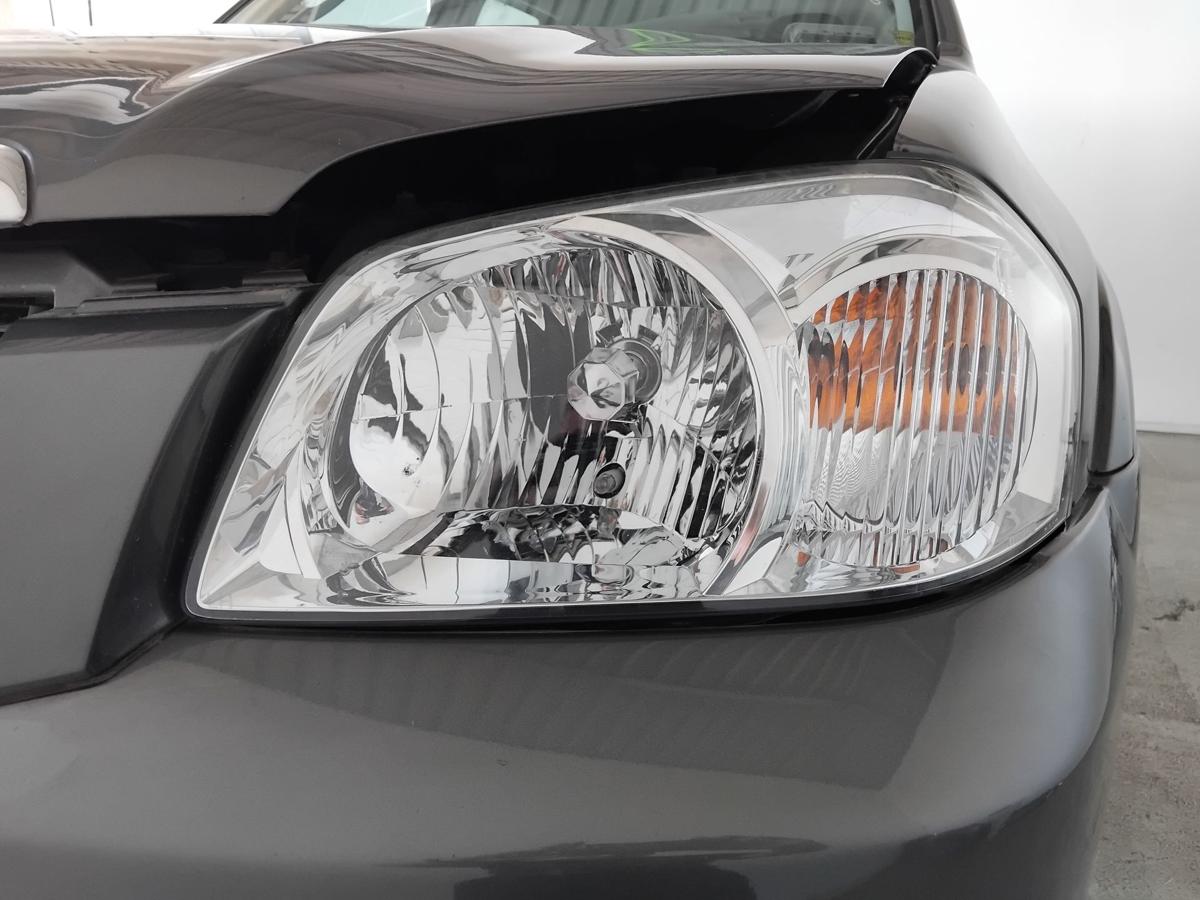 Mazda Tribute EP2 Facelift orig Scheinwerfer links Halogen mit LWR BJ2006 EU Version