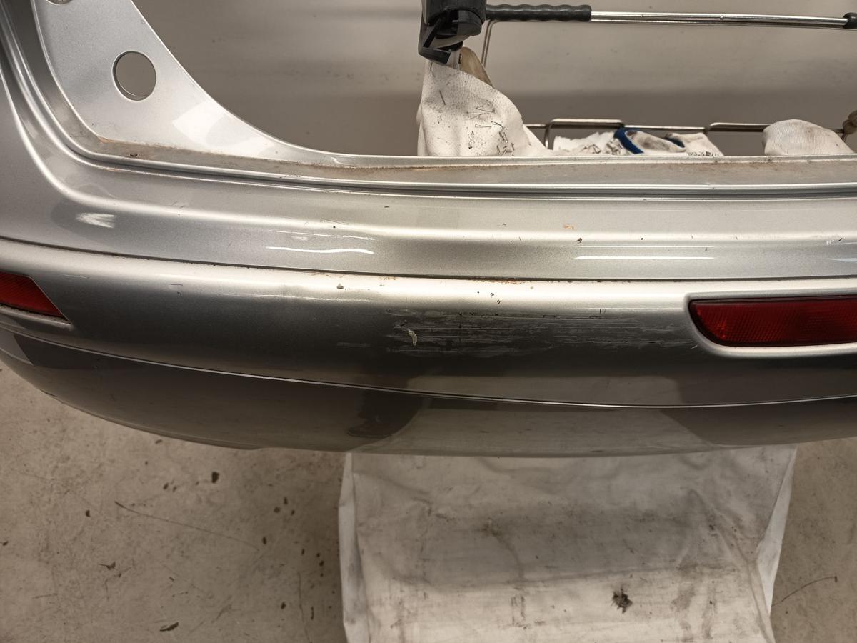 Nissan Note E11 original Sto&szlig;stange Stossf&auml;nger hinten KYO Quarzsilber Bj 2006