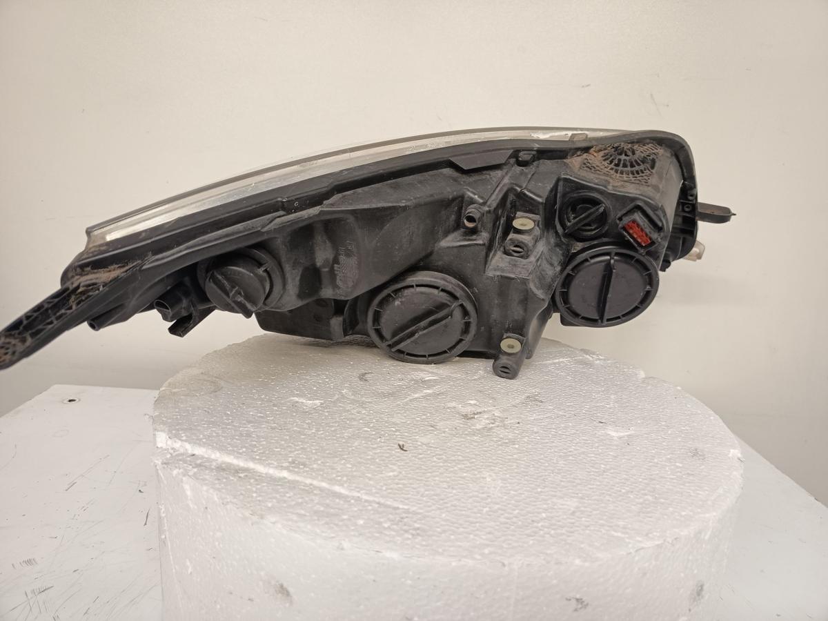 Opel Insignia A Sports T orig Scheinwerfer links Halogen Bj 2010