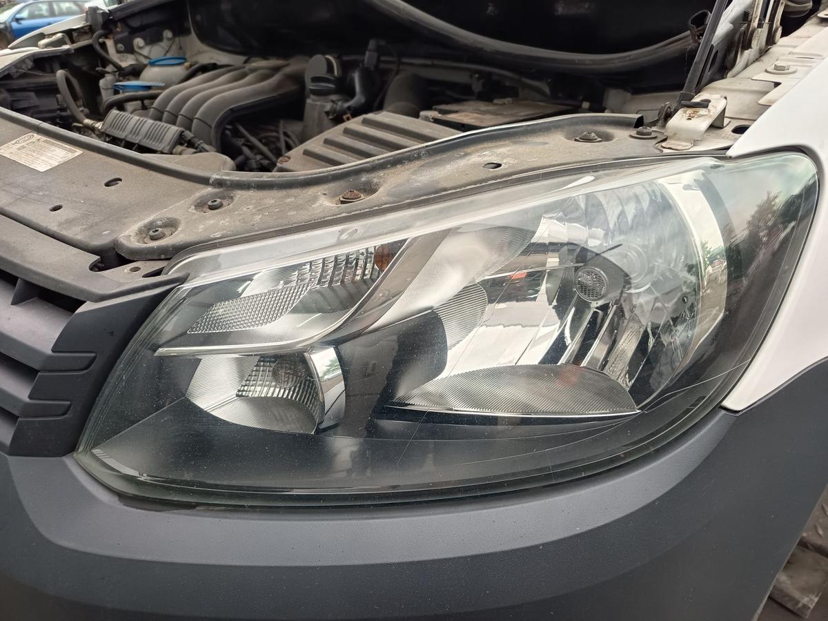 VW Caddy III original Hauptscheinwerfer links Halogen Frontlicht Bj 2012