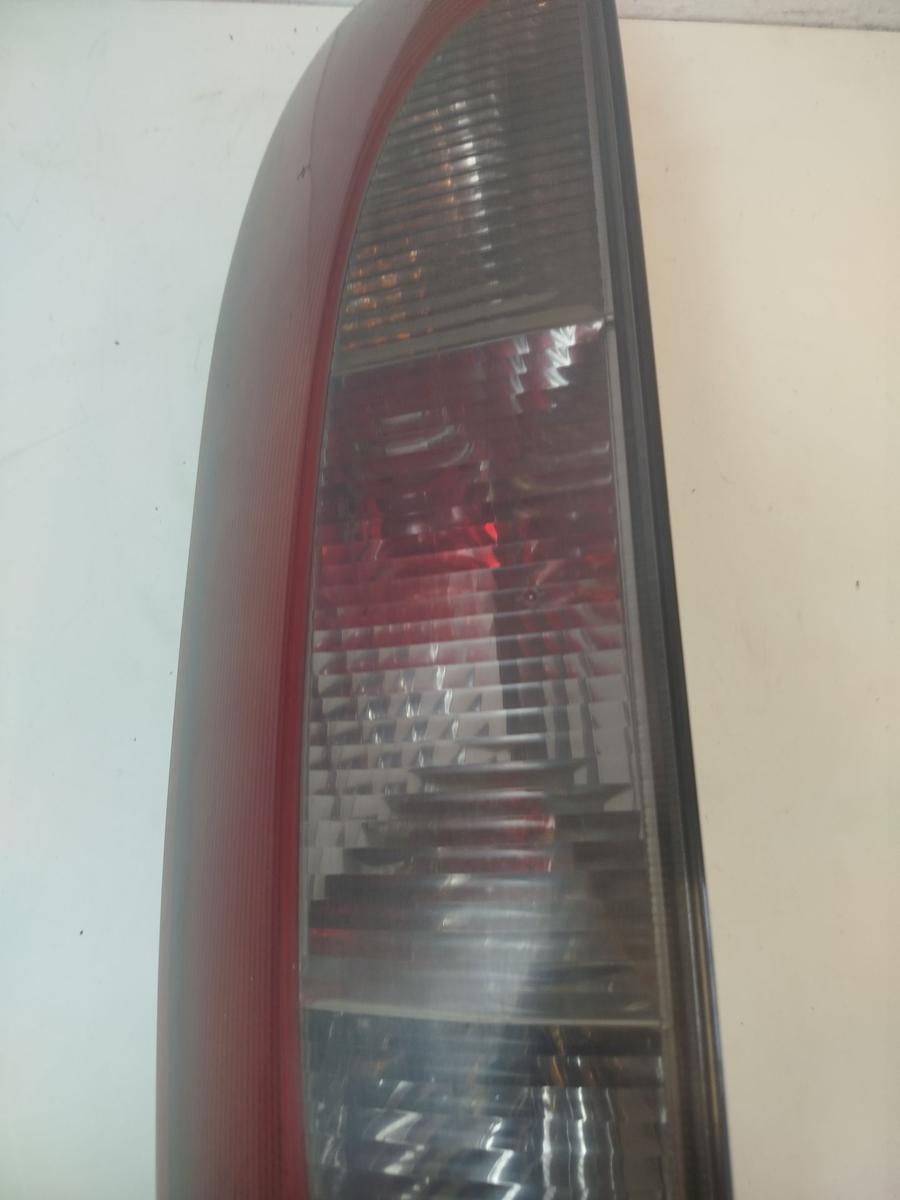 Opel Corsa C R&uuml;ckleuchte links R&uuml;cklicht Heckleuchte 3 t&uuml;rer get&ouml;nt OEM