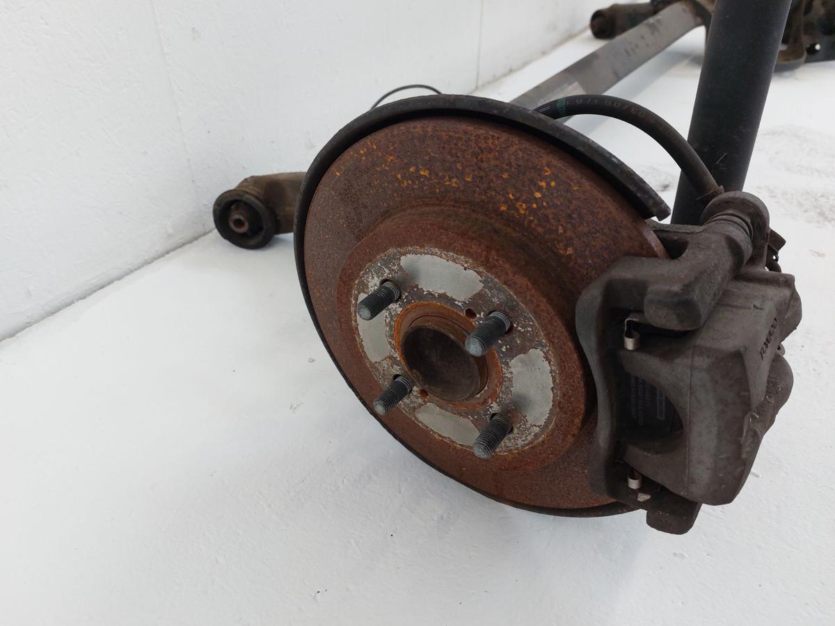 Toyota IQ Typ AJ Hinterachse Achse hinten Achsk&ouml;rper mit Schiebenbremse