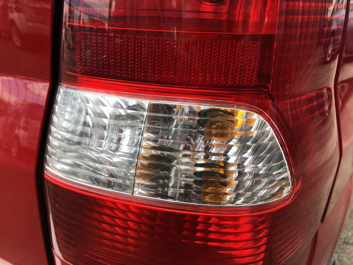 Mazda Demio DW R&uuml;ckleuchte links R&uuml;cklicht Heckleuchte Facelift ab 2000 kl Riss