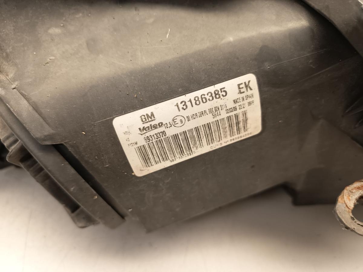 Opel Corsa D original Scheinwerfer links Halogen Kurvenlicht vor Facelift Bj 09