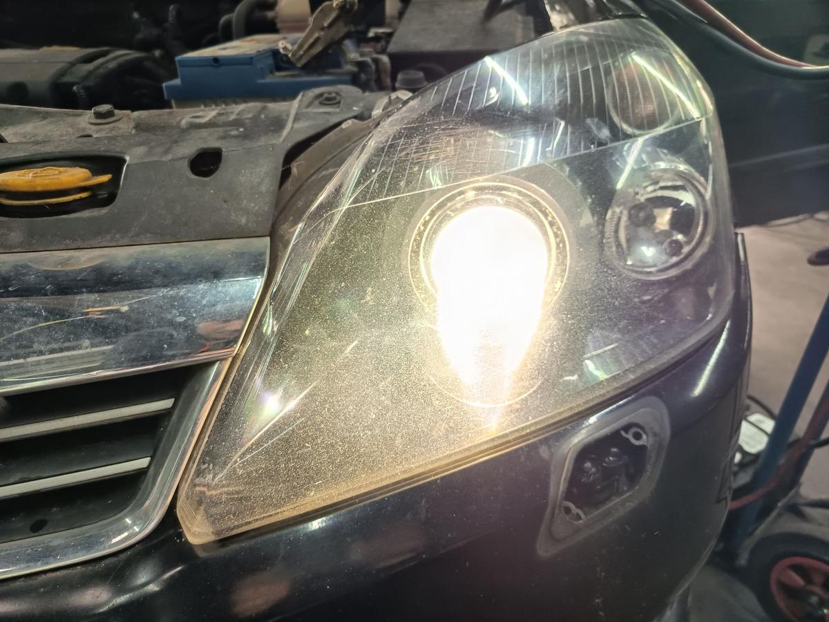 Opel Astra H original Scheinwerfer links BI Xenon Kurvenlicht Baujahr 2010