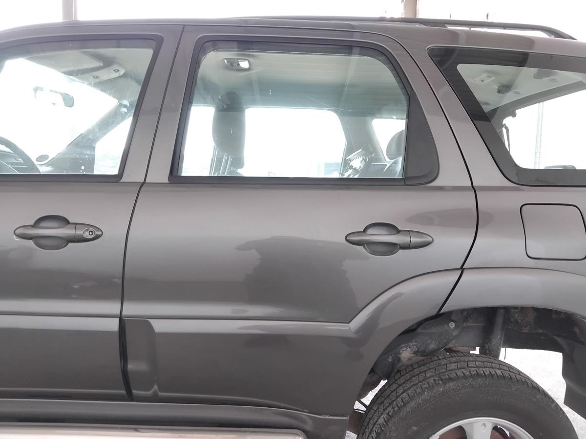 Mazda Tribute EP2 original T&uuml;r hinten links graumetallic Anrostung BJ2006