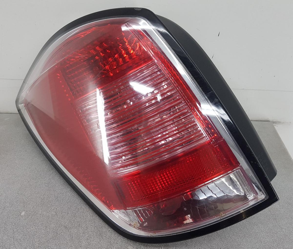 Opel Astra H Caravan Rückleuchte Rücklicht links 24451838 Bj2006 Kombi