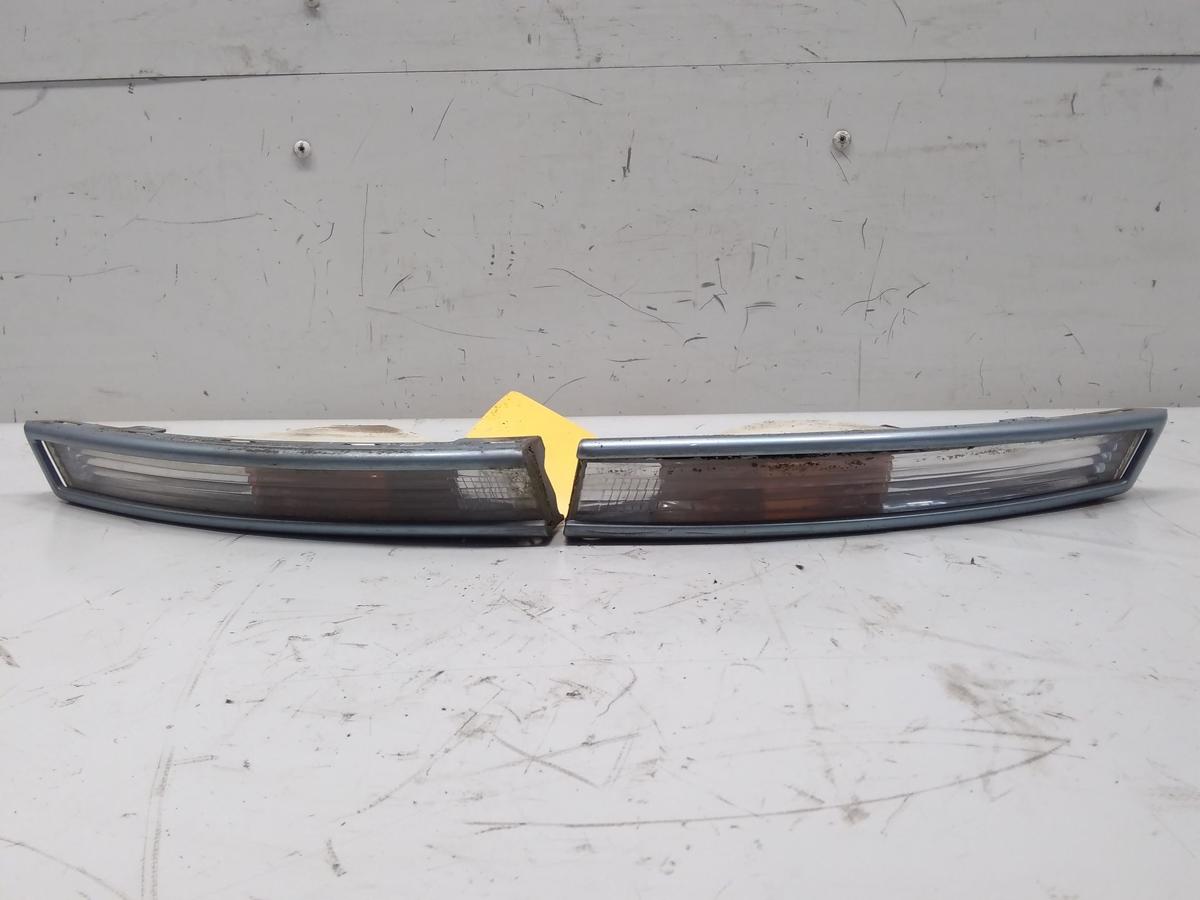 VW Passat 3C B6 original Satz Blinkleuchten weiss mit Schutzleisten Bj.2007